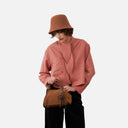 Blusa rosa Orfeo para mujer con lazada al cuello y corte corto vista frontal