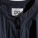 Blusa corta y amplia minimalista - CKS