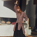 Blusa Feeka de algodón con estampado de cuadros y volante frontal combinada con falda negra