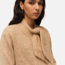 Cárdigan beige lazada cuello - Systemaction