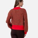 Vista trasera del jersey de punto con ondas de Surkana color rojo