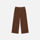 Pantalón de pana Jarman color marrón con corte recto, cintura elástica y bajo con vuelta.